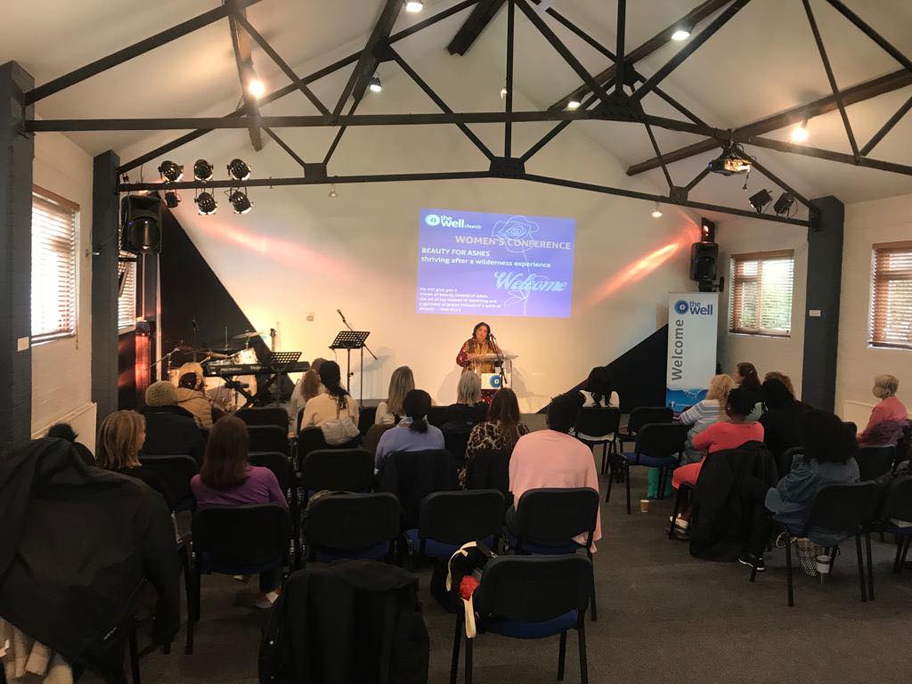 Women's Conference at The Well Church — congregation gathered for worship and teaching