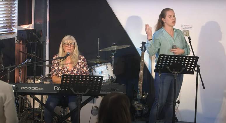 Worship band playing at The Well Church